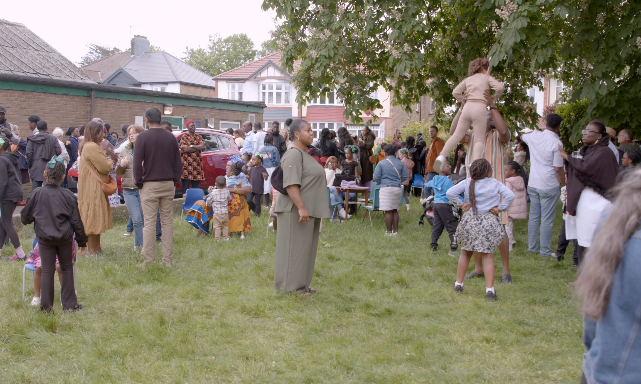 Community gathering with children at Highcombe House